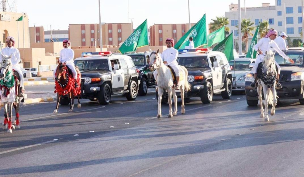 



مسيرة أمنية وخيالة احتفالاً باليوم الوطني للمملكة. (واس)